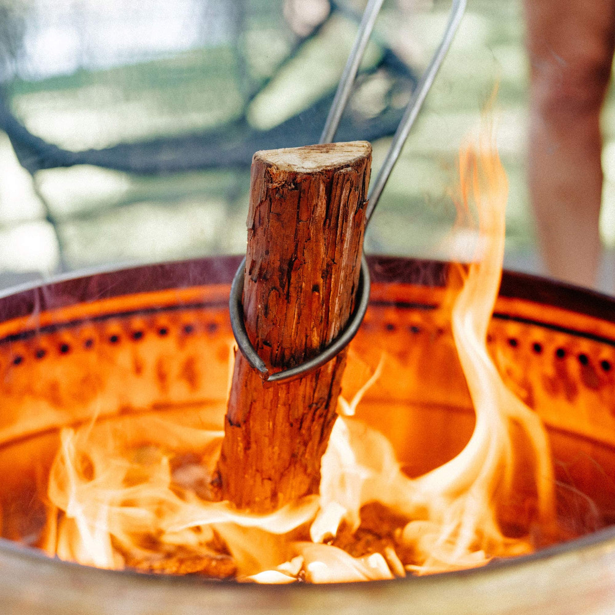 Logs loaded into a Solo Stove fire pit for quick, fragrant start