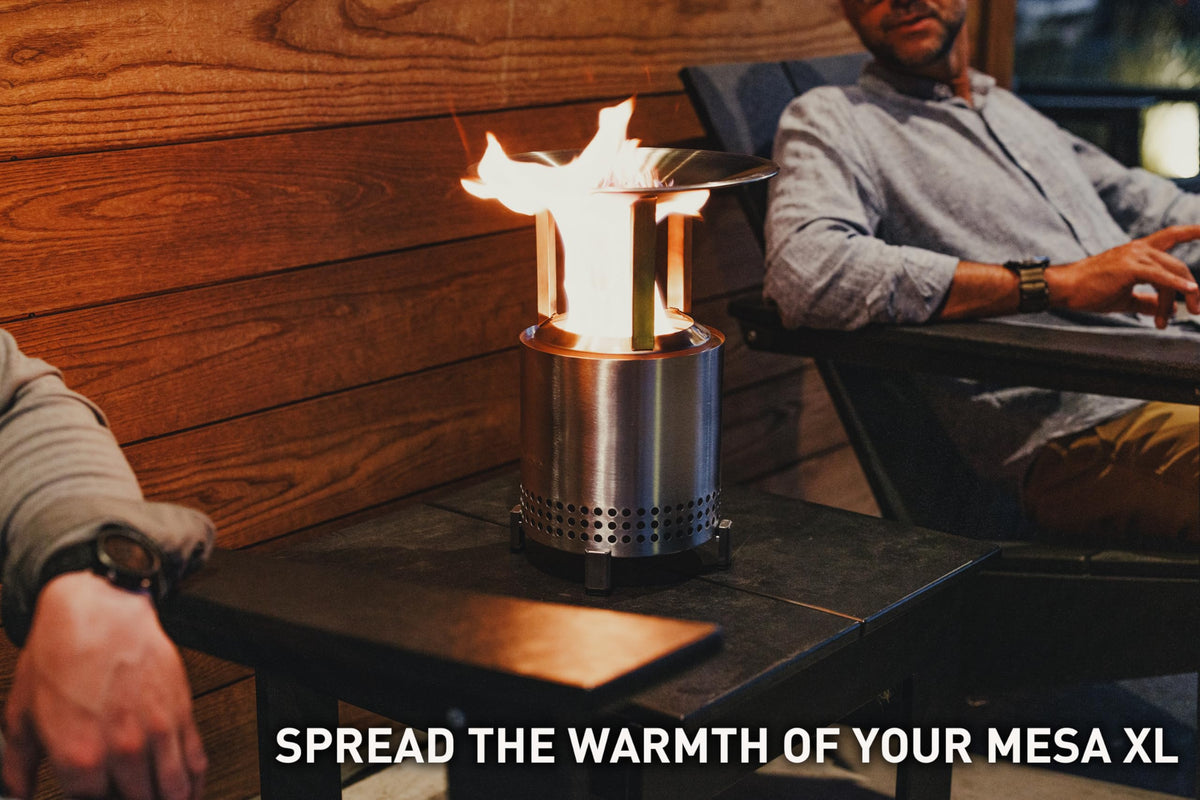 Mesa XL heat deflector with assembled legs extends warmth reach for chilly evenings.