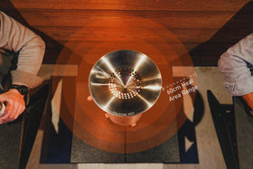Solo Stove Mesa XL heat deflector with detachable legs latches securely for quick setup.