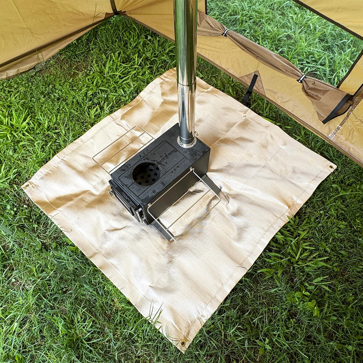 Easy to clean SoloWilder Fire Pit Mat with hose and towel after use