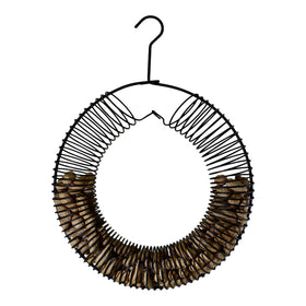 Songbird Essentials black wreath feeder hangs discreetly for wildlife.
