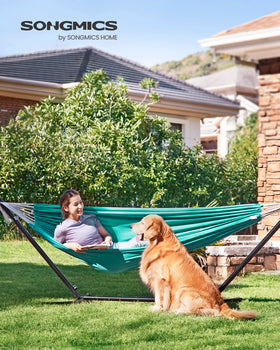SONGMICS double hammock turquoise-setup-in-garden enables easy outdoor lounging