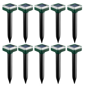 SonicPulse mole deterrent stake protects a sunlit lawn from burrows