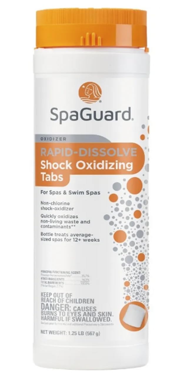 SpaGuard Rapid-Dissolve Tabs dissolving quickly beside a spa for fast oxidation and clarity.