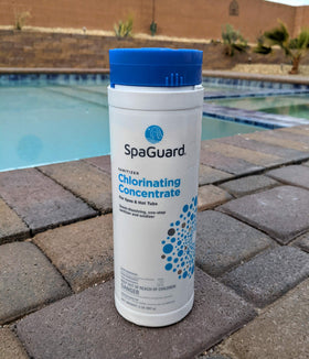 SpaGuard Chlorinating Concentrate being added to running spa water for even dosing and oxidation