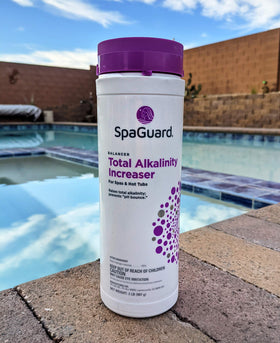 SpaGuard bottle being poured to stabilize spa alkalinity for a smoother soak