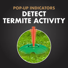 Spectracide Terminate stake installed near a deck for monitoring purposes.