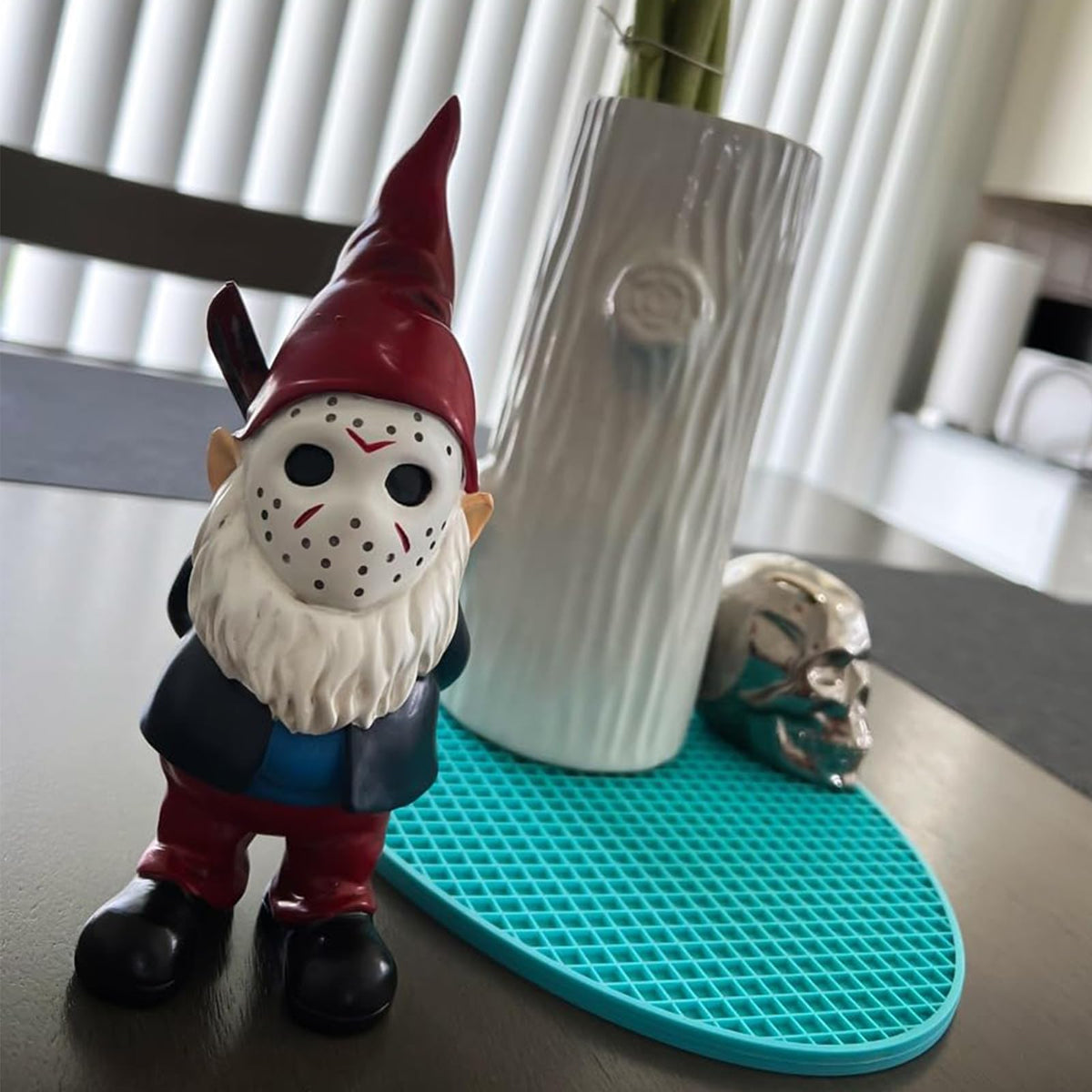 SPINNDO mini gnome on shelf enhances home decor accents.