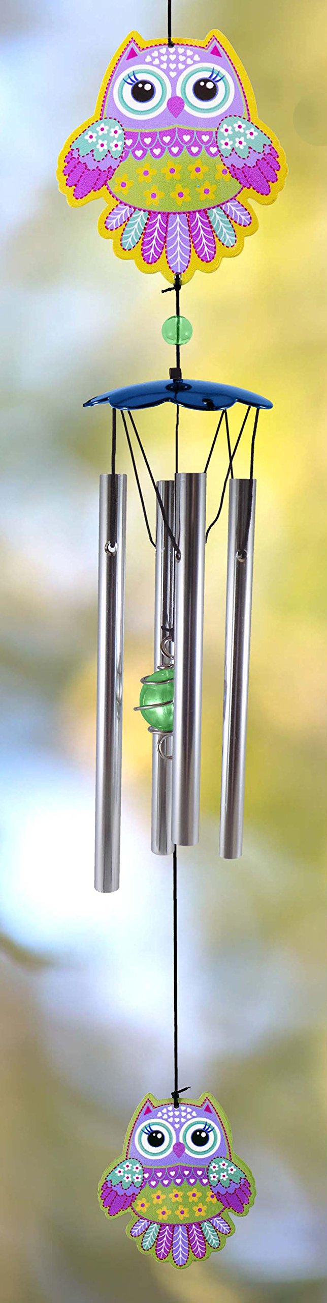 Betty Boop wind chime on a patio creating a gentle outdoor soundscape
