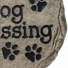 Spoontiques welcome-home stone greets guests along walkways.