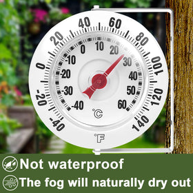 SPOROLWE thermometer in garden setting showing practical outdoor use