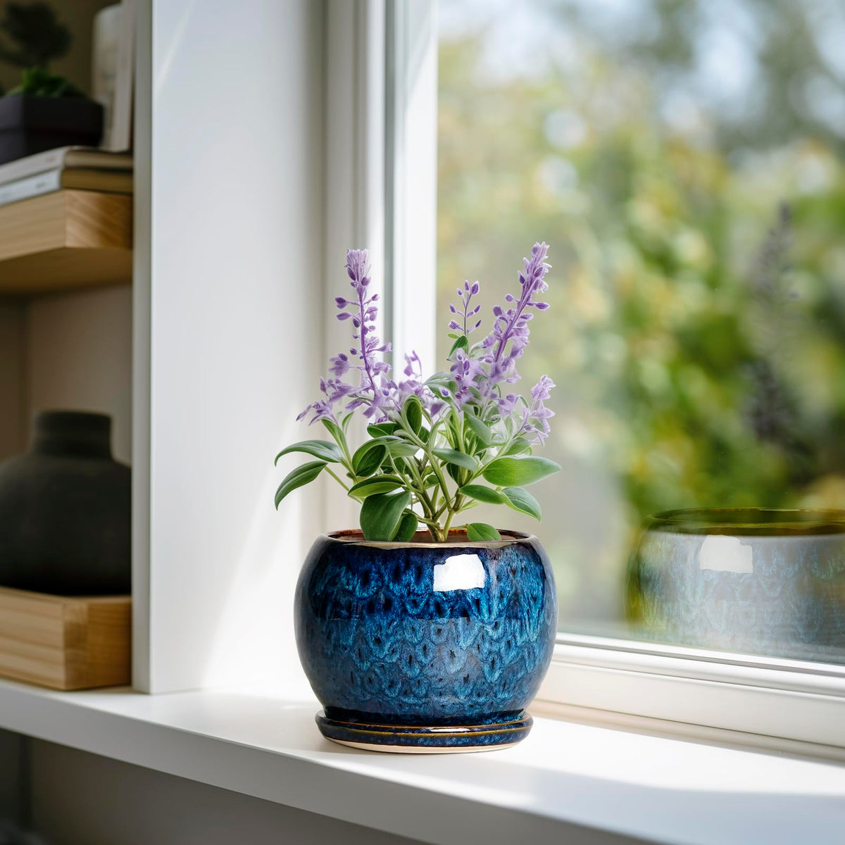 Close-up of SQOWL blue ceramic pot glaze and smooth finish