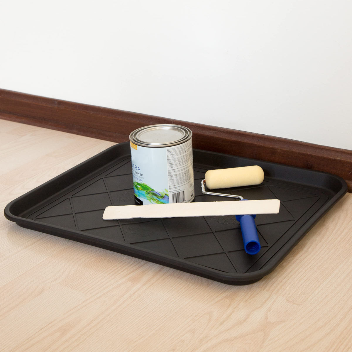 Stalwart boot tray in black complements any space and hides grime.