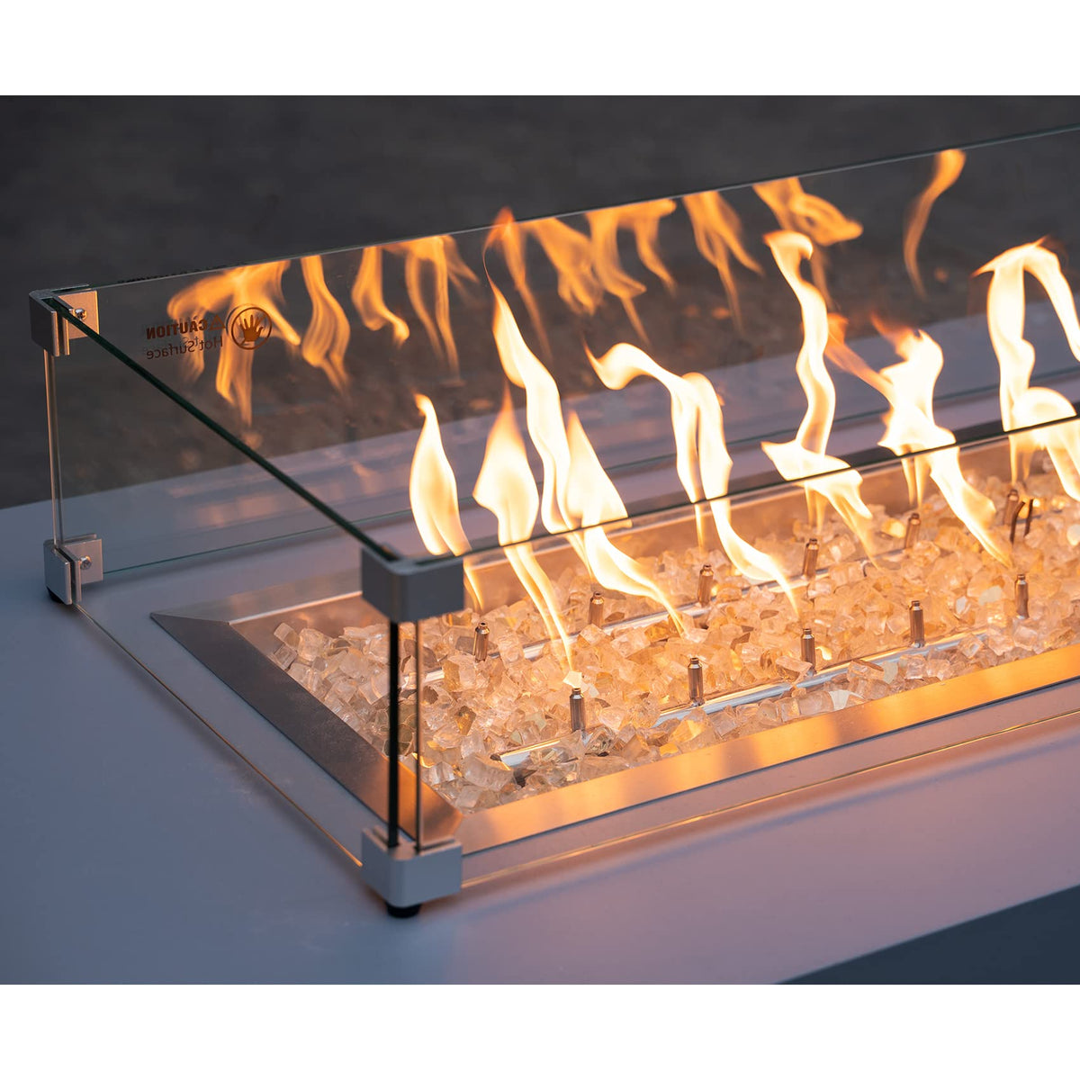 Stanbroil fireplace scene with gold halfinch glass enhances contemporary warmth
