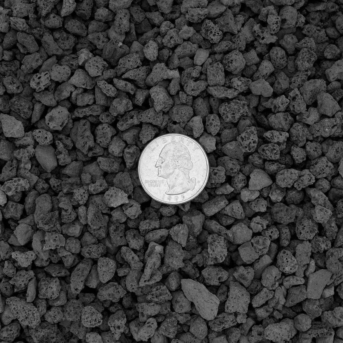 Stanbroil lava rock granules provide a neutral base layer for gas logs.