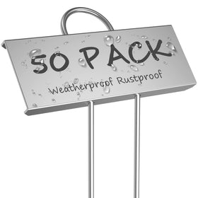 STARTOSTAR metal plant labels 50-pack on a garden bed, durable weatherproof markers.