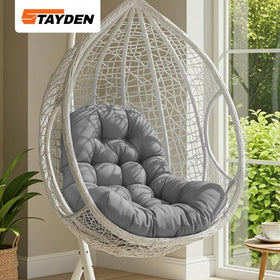 STAYDEN egg chair cushion side view highlights plush three-dimensional stitching.