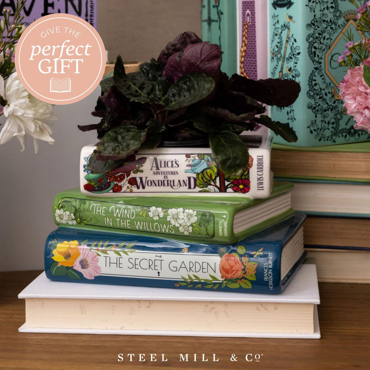 Steel Mill & Co stack-of-books ceramic planter creates a literary focal point.