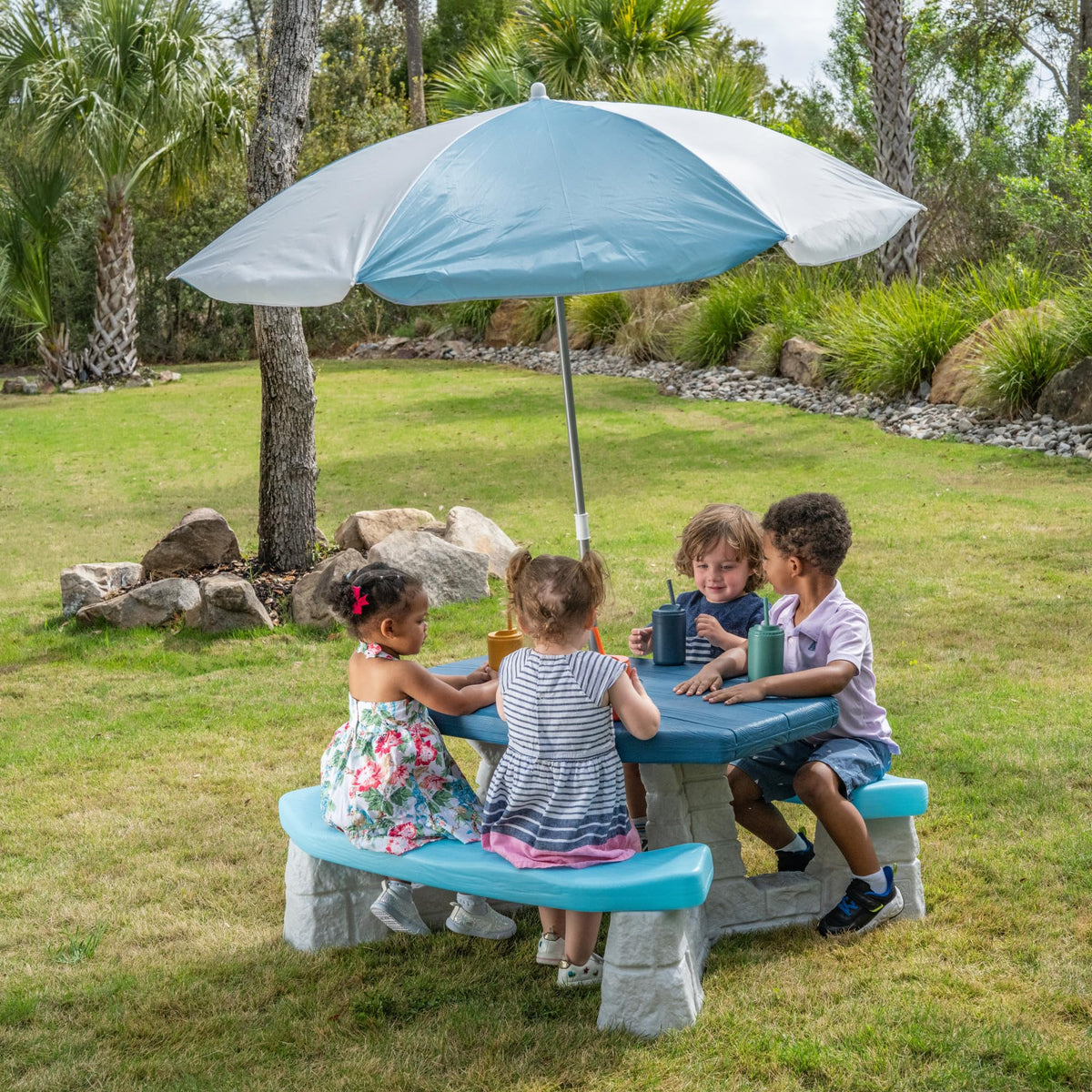 Step2 Sun & Fun Picnic Table kids seated for snacks and crafts