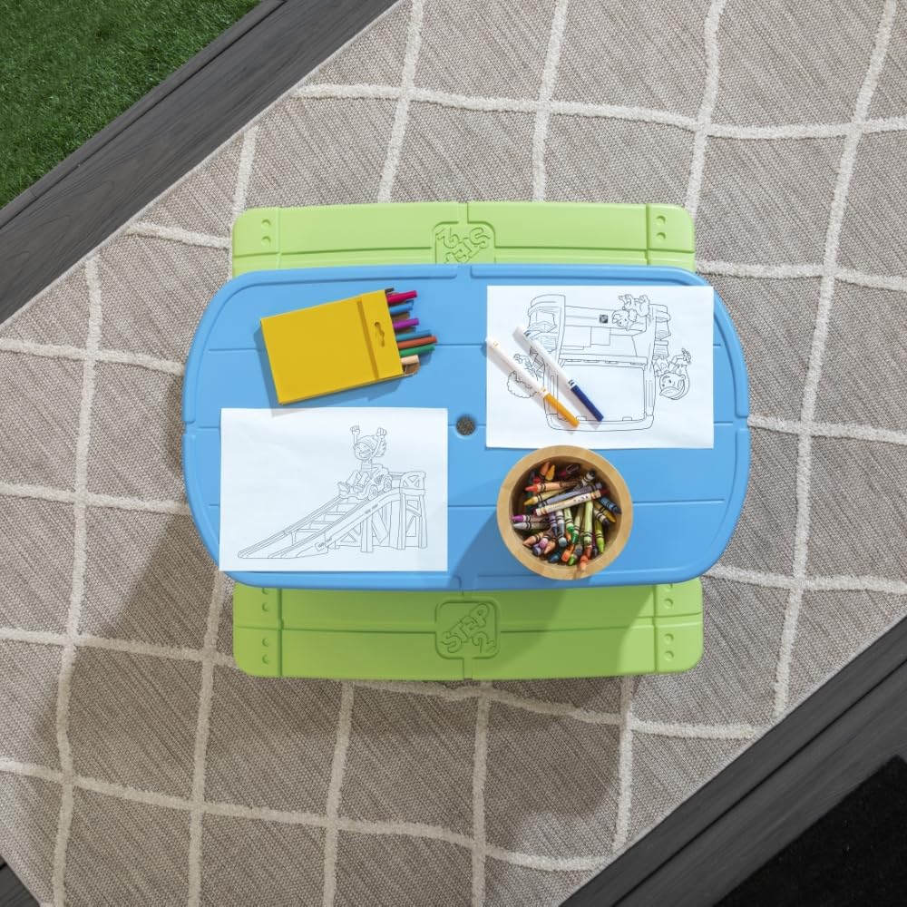 Step2 Sun & Shade seats four kids around a sturdy table during meals.