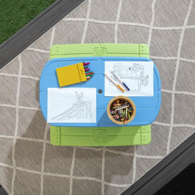 Step2 Sun & Shade seats four kids around a sturdy table during meals.