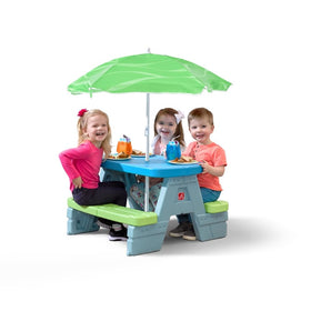 Step2 Sun & Shade table demonstrates easy clean surfaces for sanitary kids' activities.