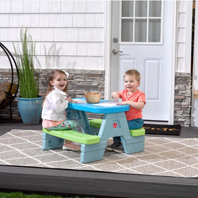 Step2 Sun & Shade table with removable umbrella shown for versatile indoor and outdoor play.