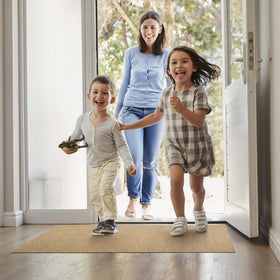 StepAura mat endures all-weather use to protect interior floors.