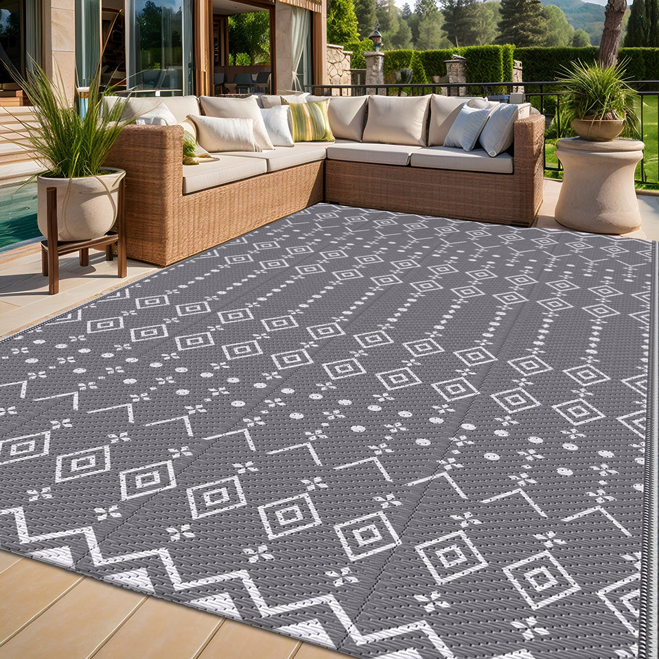 StepRite reversible outdoor rug with geometric pattern for patio or deck, easy style swap.