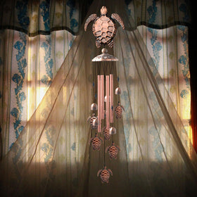 STF Sea Turtle wind chimes reflect sunlight for garden ambiance