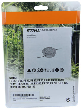 Stihl AutoCut C 26-2 trimmer head action enables efficient lawn maintenance.