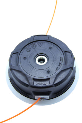 Stihl AutoCut C 26-2 head in use delivers precise edge results.