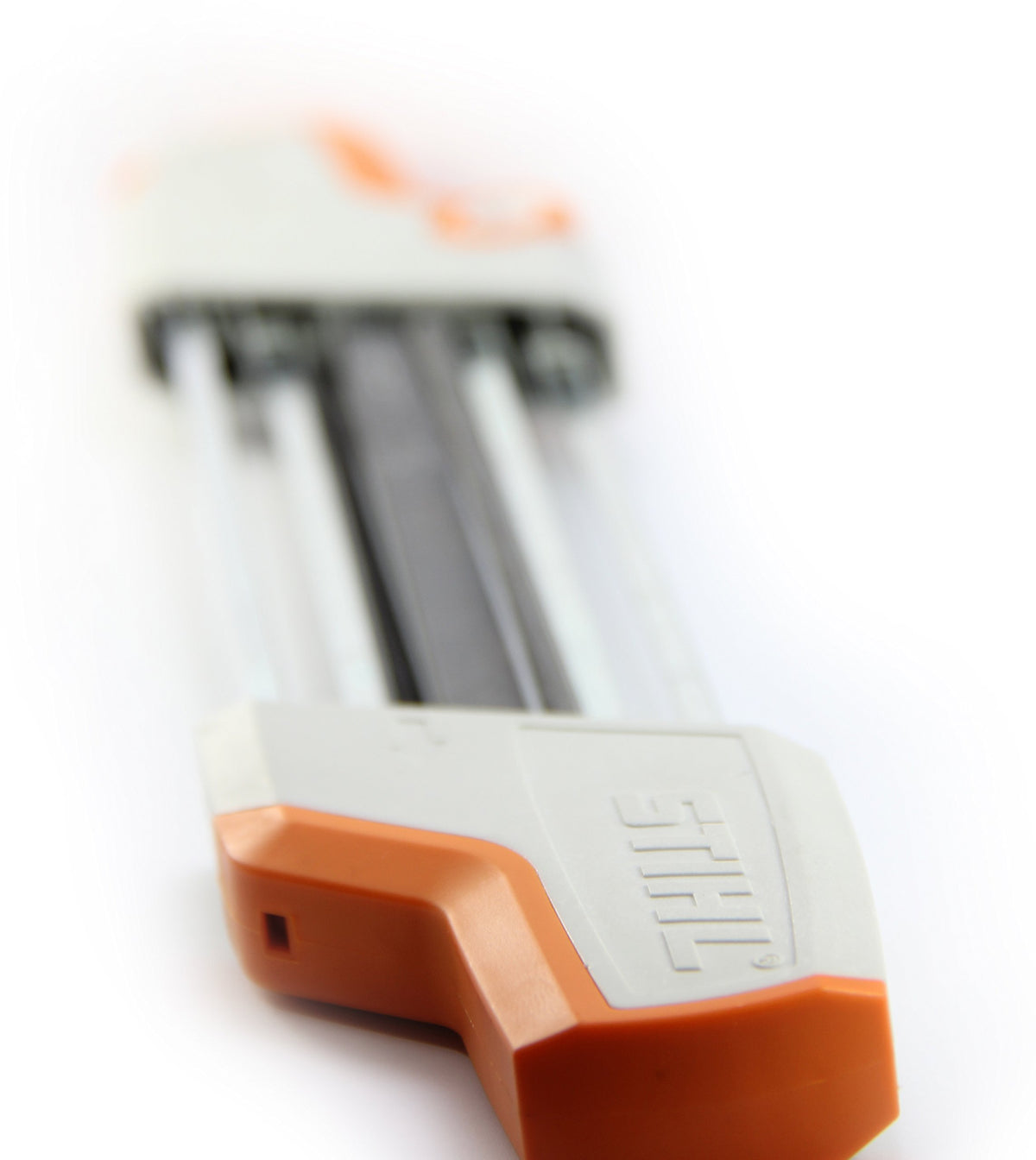 Stihl file holder kept tidy for quick access on the workbench.