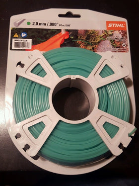 Stihl green mowing line in use promotes clean edge work.