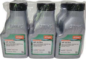 STIHL Oil Mix Ultra bottle being poured for quick, consistent fuel mixtures.