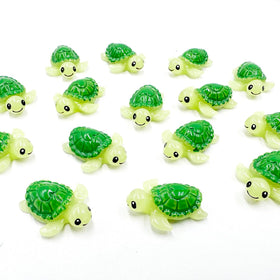 Suartus mini green turtle on bedroom shelf as cheerful decor