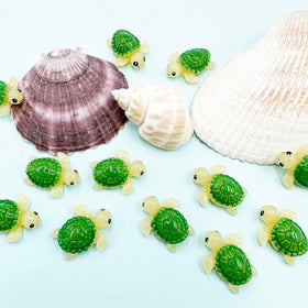 Close-up of Suartus mini green turtle figurine with vivid color