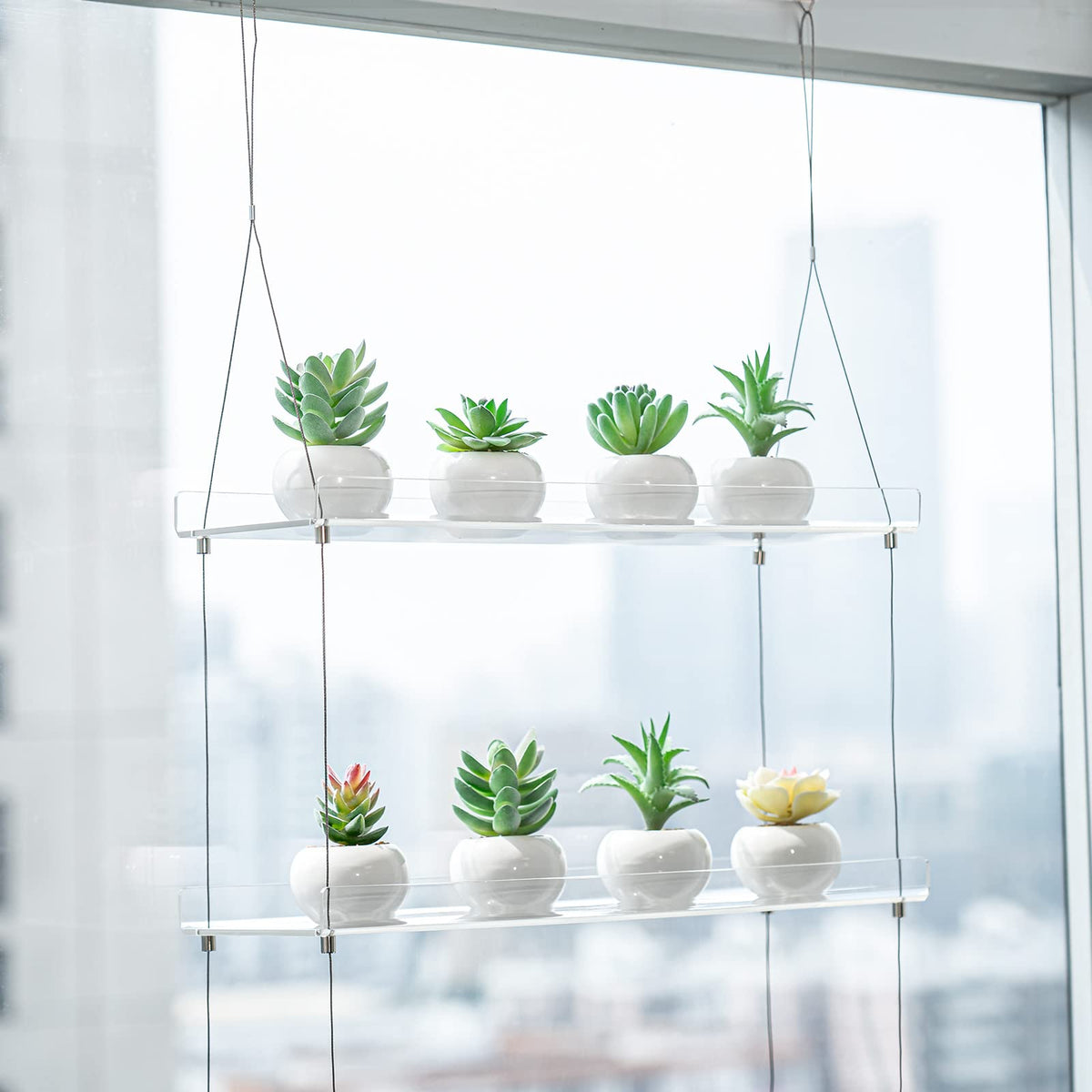 Sumerflos transparent plant stand adds living room decor and organization.