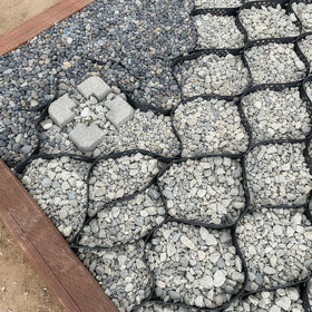 Sumloty Gravel Grid adjustable and cut to fit irregular spaces.