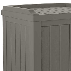 Suncast cushion and tool storage keeps garden tools and blankets organized.