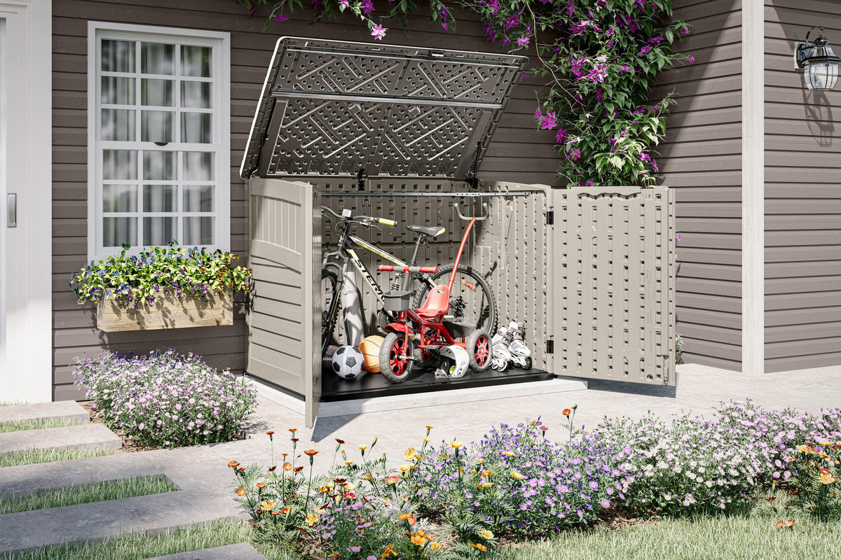 Suncast shed lid open with gas shocks for easy one-handed lifting