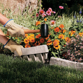 Suncast lawn edging helps contain beds and prevents hose intrusions