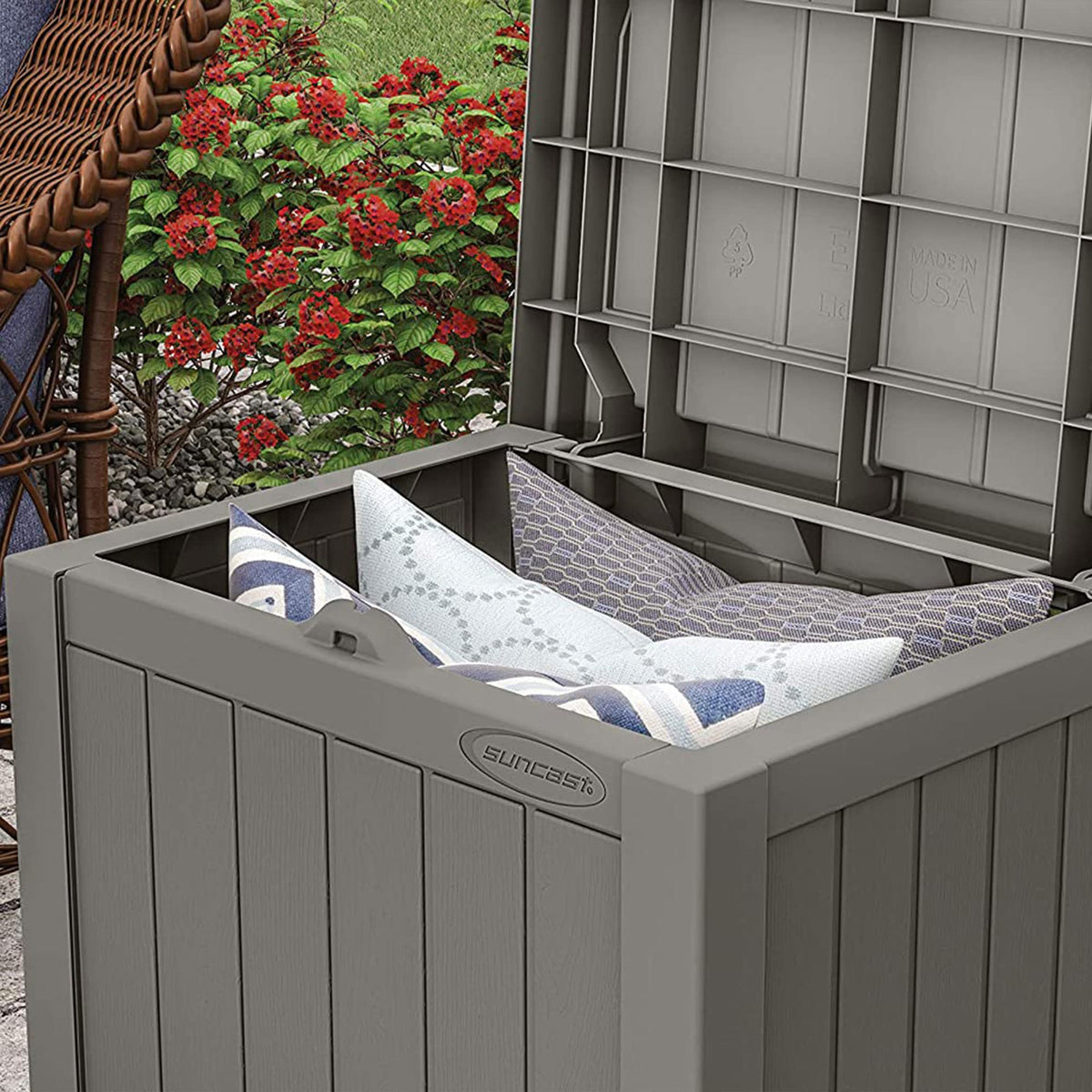 Suncast patio furniture with stone-gray finish for cohesive outdoor décor.