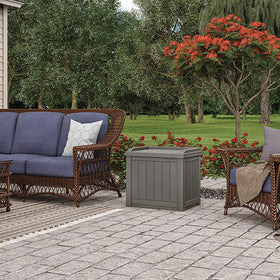 Suncast rain-resistant storage box keeps contents dry outdoors.