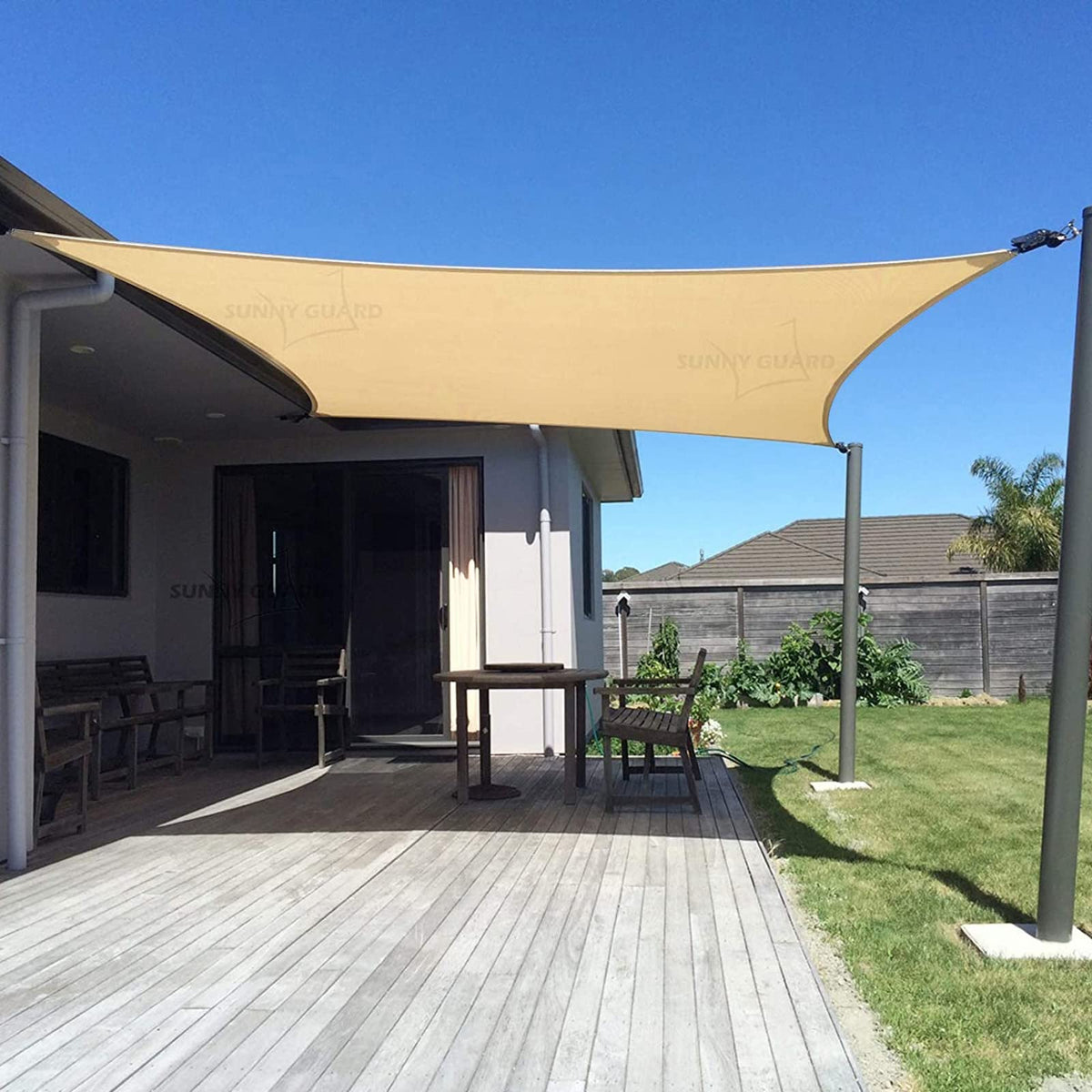 Sunny Guard sun shade sail 12x16 in sand color provides UV protection and cooling.
