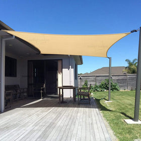 Sunny Guard sun shade sail 12x16 in sand color provides UV protection and cooling.