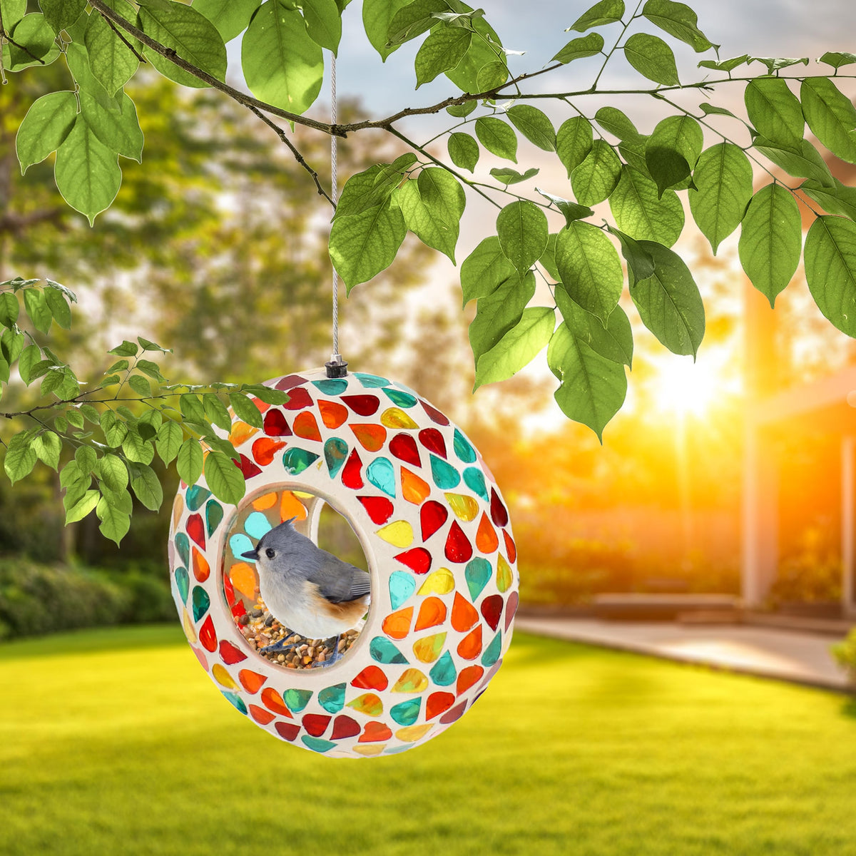Sunnydaze Confetti Mosaic Bird Feeder garden setup on a branch
