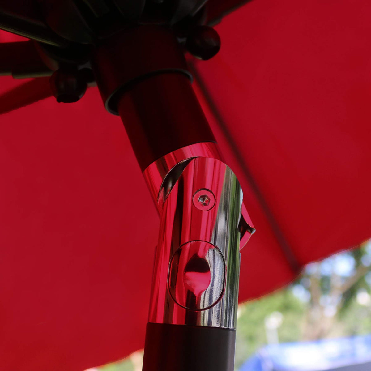 Sunnyglade 9ft red umbrella side view demonstrates broad coverage at the table.