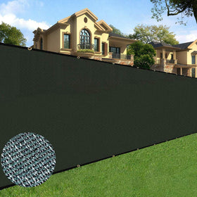 Sunnyglade privacy screen 5ft by 50ft on fence reduces street view while remaining breathable.
