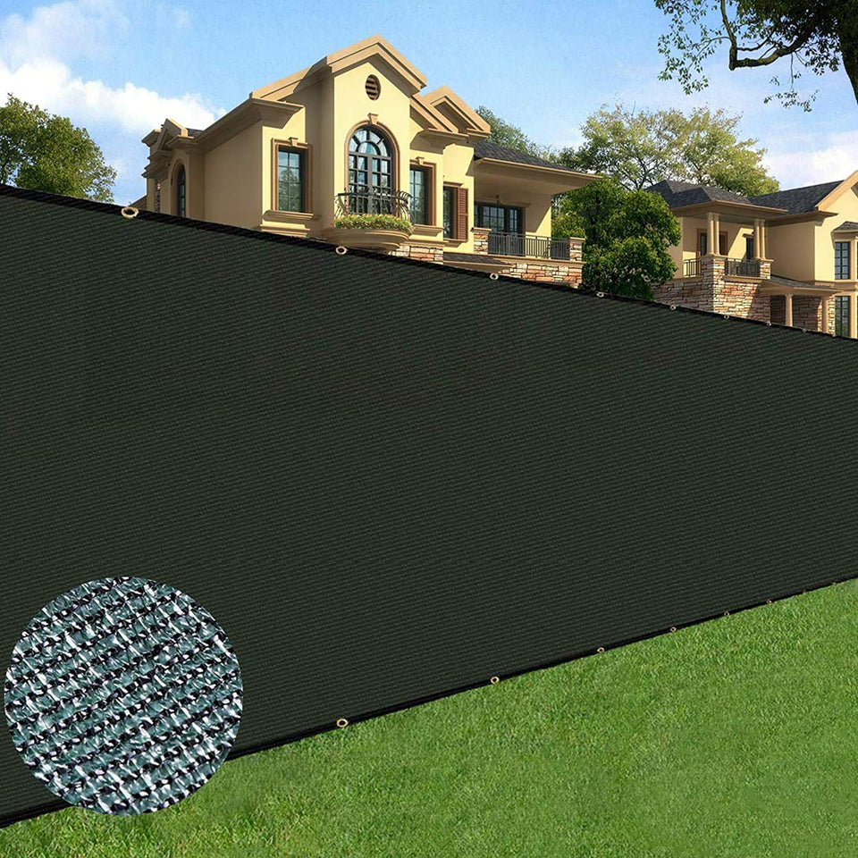 Sunnyglade privacy screen 5ft by 50ft on fence reduces street view while remaining breathable.